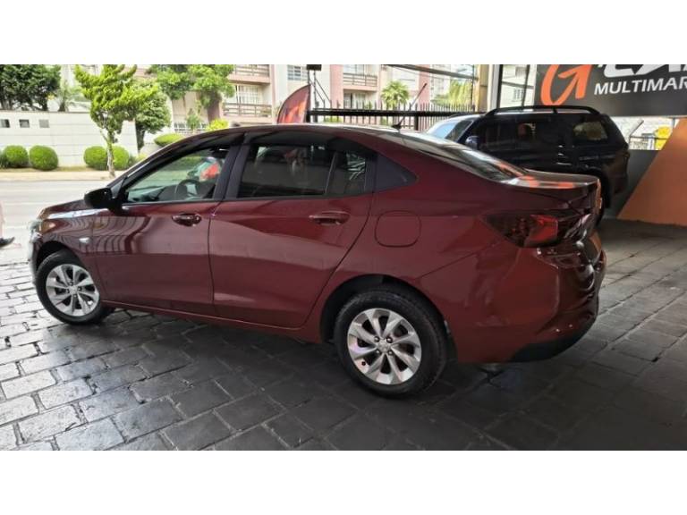 CHEVROLET - ONIX - 2021/2021 - Vermelha - R$ 59.900,00