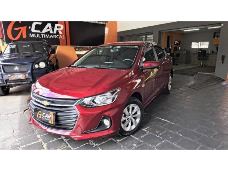 CHEVROLET - ONIX - 2021/2021 - Vermelha - R$ 59.900,00