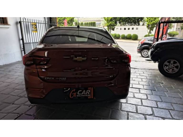 CHEVROLET - ONIX - 2021/2021 - Vermelha - R$ 59.900,00